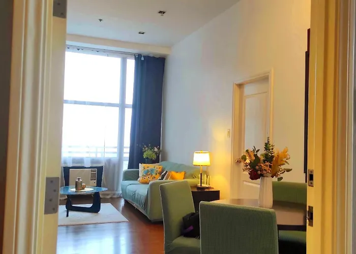 Apartment Spacious High Ceiling 2 Bedroom 66th Flr Corner Unit With Balconies - Free Sauna Pool Gym View Of Skyline Bay-sunset Manila