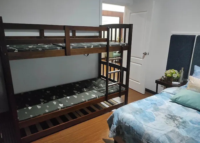 Apartment Spacious High Ceiling 2 Bedroom 66th Flr Corner Unit With Balconies - Free Sauna Pool Gym View Of Skyline Bay-sunset Manila